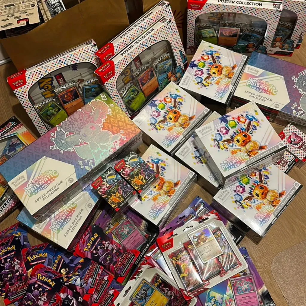Pokemon TCG haul with Prismatic Evolutions Elite Trainer Boxes and booster packs